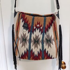 Saddle bag with fringe and belt strap